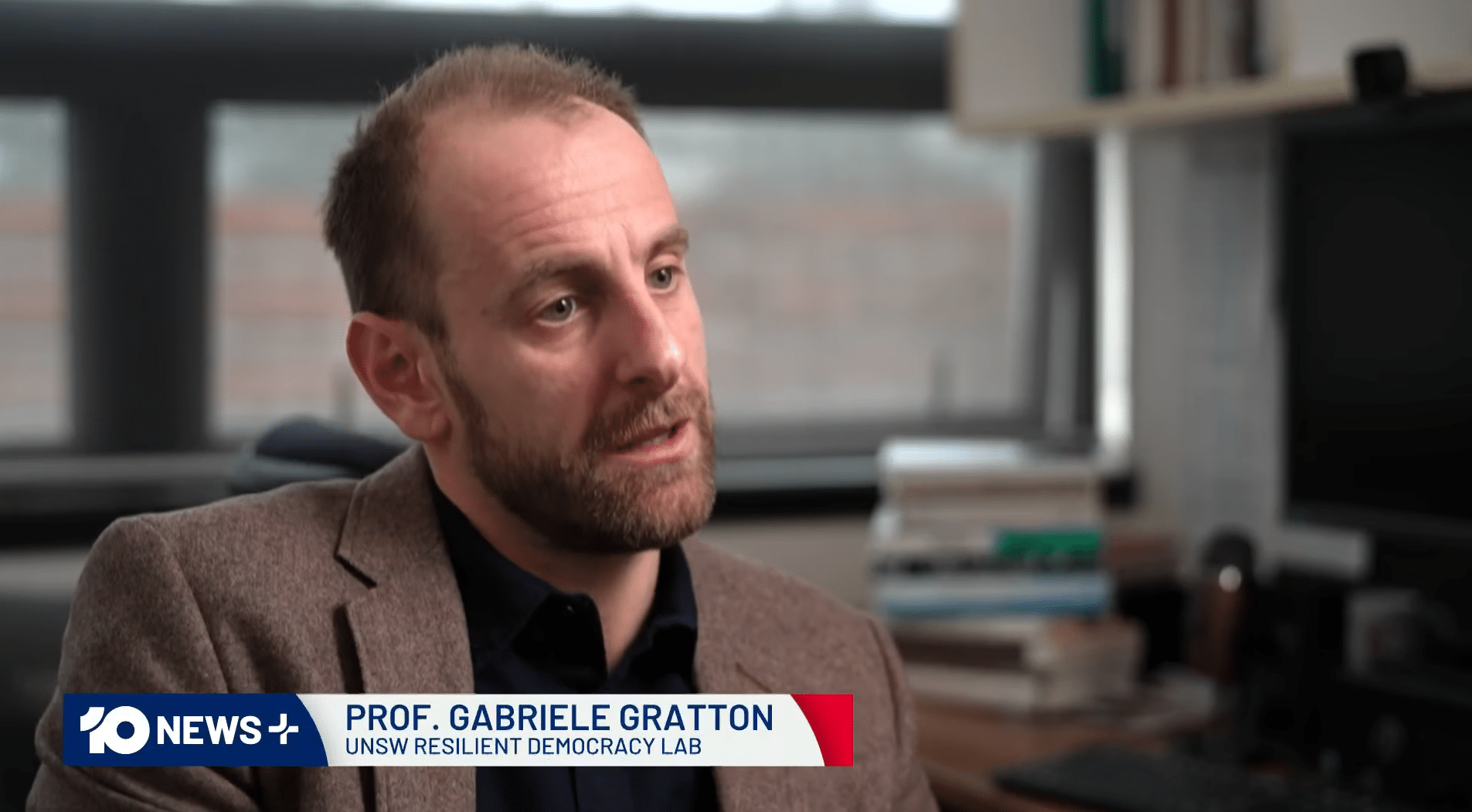 Professor Gabriele Gratton speaking to 10 News+